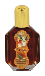 Prabhujis Gifts | Perfume Attar Oil Tilak for Love - 0.5oz Rollon Juicy orange and Concord grape are laced with sweet saffron a