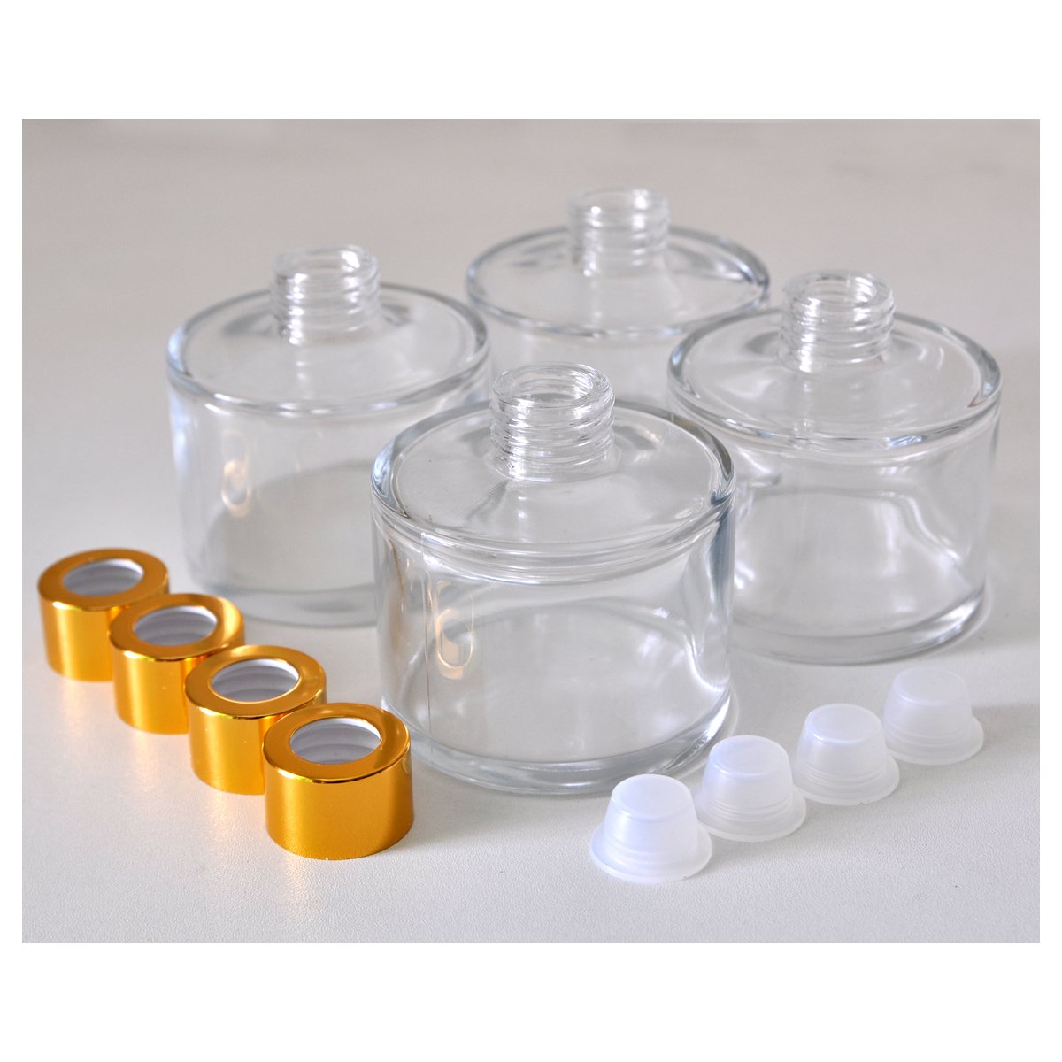 Ougual Set of 4 Cylindrical Round Glass Essential Oils Diffuser Bottles (100ML, Gold Cap)