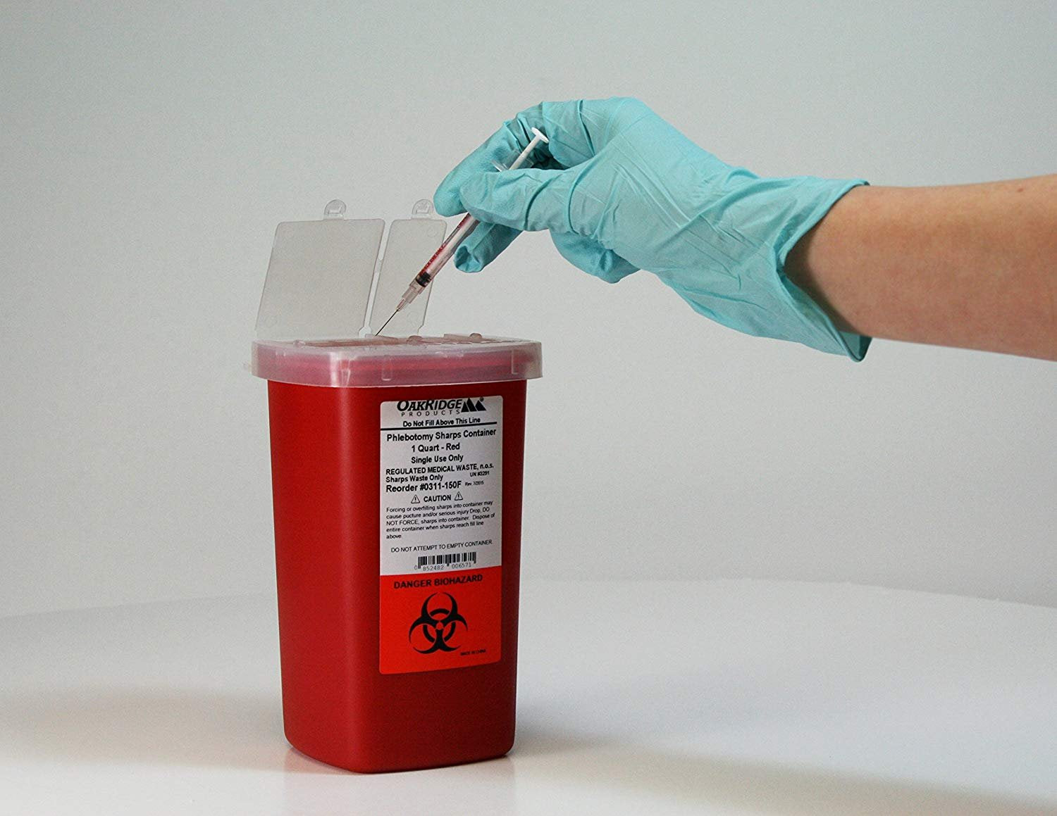 Oakridge Products 1 Quart size Sharps and Needle Container. Integrated needle unwinder